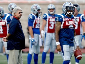 Alouettes GM and head coach Jim Popp watches as the team takes part in the pregame warmup during CFL action against the Winnipeg Blue Bombers at Molson Stadium in Montreal on Friday August 26, 2016.