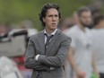 Montreal Impact head coach Mauro Biello looks on during the second half of their MLS soccer match against the New York City FC at Saputo Stadium in Montreal on Sunday, July 17, 2016.