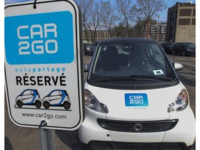 Car2go vehicles parked in a lot on St-Jacques St. in Montreal Monday May 4, 2015.