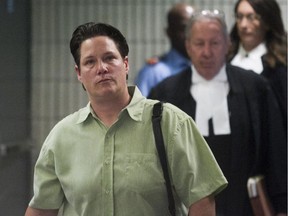 Former Montreal police officer Stéfanie Trudeau, left, also known as Agent 728, after her sentencing hearing at Palais de Justice in Montreal May 26, 2016.