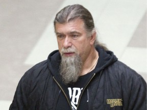 In 2014, Salvatore Cazzetta, the alleged leader of the Hells Angels in Quebec, leaves a Longueuil courthouse.