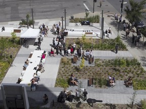 People have their lunch at the newly inaugurated  Iona-Monahan Place corner of Esplanade and Chabanel on Thursday September 1, 2016.