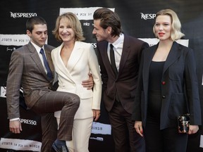Writer-director Xavier Dolan (far left) gets a leg up at Théâtre Outremont on Monday with help from stars Nathalie Baye (second from left), Gaspard Ulliel and Léa Seydoux for the Quebec première of Juste la fin du monde.