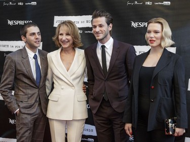 Left to right: Director Xavier Dolan, and actors Nathalie Baye, Gaspard Ulliel, and Léa Seydoux, pose for photos on the red carpet before the Montreal premiere of their film Juste la fin du monde (It's Only the End of the World) at the Théâtre Outremont in Montreal on Monday, September 12, 2016.
