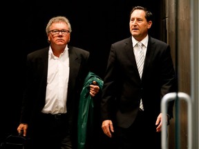 Former Montreal mayor Michael Applebaum, right, leaves the Montreal courthouse with lawyer Omer Carrier  on Monday, Sept. 12, 2016.