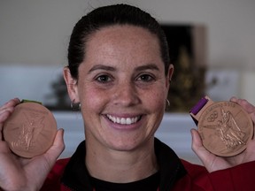 Olympic bronze medallist Rhian Wilkinson with her two medals in Baie-D'Urfé, on Monday, September 12, 2016.