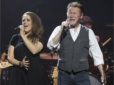 Don Henley sings a duet with Lily Elise, one of his backup singers, at the Bell Centre in Montreal on Wednesday, Sept. 14, 2016.