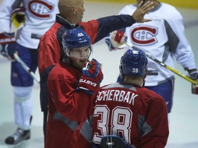 Arturri Lehkonen, middle, speaks to Nikita Scherbak during the first day of Canadiens rookie camp at Bell Sports Complex in Brossard on September 15, 2016.(Marie-France Coallier / MONTREAL GAZETTE)