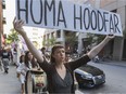 Hayley Lewis holds up a sign in support of Concordia University professor emerita Homa Hoodfar who has been imprisoned in Iran for more than 100 days. The  demonstration in support of Hoodfar was held outside Concordia on Wednesday, September 21, 2016 in Montreal.