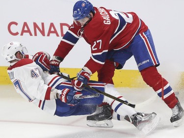 Alex Galchenyuk knocks Alexander Radulov down during a Red vs. White scrimmage with Montreal Canadiens players at the Bell Centre in Montreal Sunday, September 25, 2016.