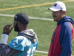 Alouettes offensive coordinator Anthony Calvillo, right, with quarterback Rakeem Cato, during practice on Wednesday September 28, 2016.