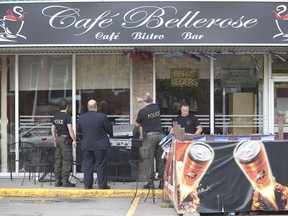 Police investigate a gangland-style shooting at Café Bellerose on Bellerose street in Laval on Sept. 29., 2010.