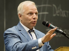 Parti Québécois leadership candidate Jean-François Lisée makes a point during debate at Université de Montréal in Montreal Tuesday Sept. 6, 2016.