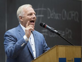 Parti Québécois leadership candidate Jean-François Lisée makes a point during debate with other candidates at Université de Montréal in Montreal Tuesday September 6, 2016.