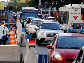 Sherbrooke St. W. grinds to a halt during the evening rush hour in Montreal on Tuesday September 6, 2016. A new survey claims 3 out of 10 Quebec businesses say they have either lost employees, or missed out on qualified candidates because of traffic woes.