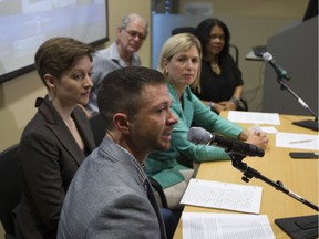 Marc Lafrance, with Emer O'Toole,  Kimberly Manning, Charles Draimin and Françoise Naudillon at a news conference Wednesday. “It is unbearable for us,” Lafrance says, “but we are in awe of her resilience in the face of such conditions.”
