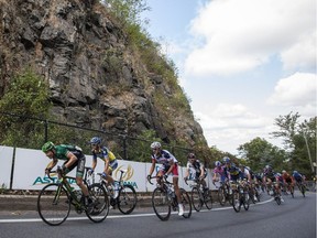 The peloton climbs Mont-Royal as they compete in the Grand Prix Cycliste de Montreal in Montreal on Sunday, September 9, 2012. (Dario Ayala/THE GAZETTE)