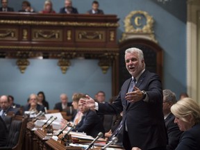 Quebec Premier Philippe Couillard responds to the Opposition during question period, Tuesday, September 20, 2016 at the legislature in Quebec City.