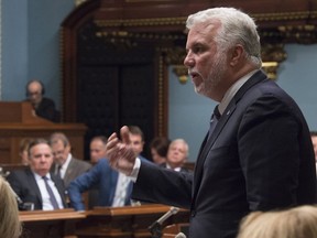 Quebec Premier Philippe Couillard responds to the Opposition during question period Tuesday, September 20, 2016 at the legislature in Quebec City.