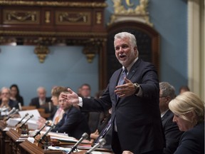 Quebec Premier Philippe Couillard responds to the Opposition during question period, Tuesday, September 20, 2016 at the legislature in Quebec City.