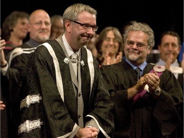 Dawson College Professor Stephen Toope is emotional following his speech, June 21, 2007, at the first convocation since the shooting rampage nine months earlier. Toope is no stranger to tragedy. His parents, retired Rev. Frank Toope and his wife Jocelyn, were murdered in their Beaconsfield home in 1995. Left is Dawson's Director General Richard Filion.