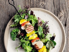 Scallops and fresh vegetables fill skewers for grilling in this recipe from a restaurant in Whistler.