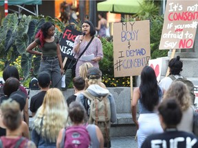 Stacey Gomez addresses a crowd gathered on Tuesday for The Night Is Not Enough. "We don't just want the night, we want the whole day to feel safe."