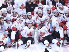 Team Canada poses with the trophy following their victory over Team Europe during World Cup of Hockey finals action in Toronto on Thursday, September 29, 2016.