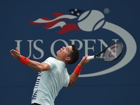 Canada's Milos Raonic serves to American Ryan Harrison during second-round match at the U.S. Open on Aug. 31, 2016. Harrison upset Raonic in four sets, winning 6-7 (4), 7-5, 7-5, 6-1.