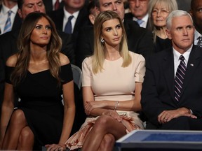 Melania Trump (L), Ivanka Trump (C) and Republican candidate for Vice President  Mike Pence wait before the first presidential debate at Hofstra University in Hempstead, New York on September 26, 2016.