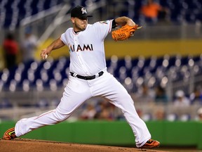 Jose Fernandez #16 of the Miami Marlins pitches during the game against the Washington Nationals at Marlins Park on September 20, 2016 in Miami, Florida.