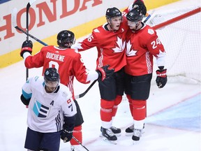 Jonathan Toews (#16) of Team Canada celebrates his first period goal with Corey Perry (#24) against Team Europe during the World Cup of Hockey tournament at the Air Canada Centre on September 21, 2016 in Toronto, Canada.