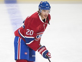 Montreal Canadiens' Zach Redmond skates during the warm-up prior to an NHL pre-season hockey game against the New Jersey Devils in Montreal, Monday, September 26, 2016.
