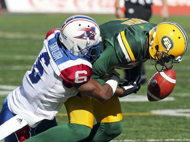 Montreal Alouettes' Ramon Taylor forces the ball out of Edmonton Eskimos' Adarius Bowman's hands for a fumble during CFL action at Molson Stadium in Montreal on Monday, Oct. 10, 2016.  The Alouettes recovered the ball.
