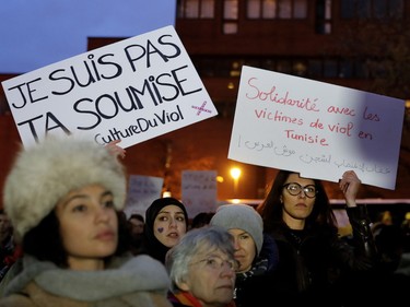 People take part in a protest to denounce rape culture at Place Émilie-Gamelin on Wednesday, Oct. 26, 2016.