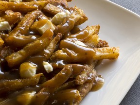 Local Input~ Canadian cuisine, Poutine, gravy, french fries, and cheese curd. Credit: Getty Images.

1006 ar poutine origins
