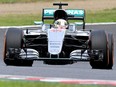 Lewis Hamilton steers his Mercedes during practice for the Japanese Grand Prix in Suzuka on Oct. 7, 2016.