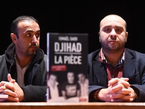 Belgian filmmaker, playwright and stage director Ismael Saidi (R) and actor Reda Chebchoubi present the book adapted from Saidi's play "Djihad" during a press conference in Brussels on December 4, 2015. The opening show of the play "Djihad", a tragicomedy recounting the journey of three youths from Brussels gone to Syria on a jihad, took place in December 2014, shortly prior to the Charlie Hebdo attacks in Paris, and has met with unexpected success in Belgium in the past year. (EMMANUEL DUNAND/AFP/Getty Images)