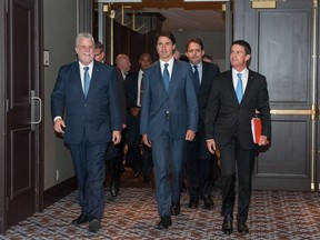 French Prime Minister Manuel Valls, right, Quebec Premier Philippe Couillard, left, and Canadian Prime Minister Justin Trudeau in Montreal on October 13, 2016.