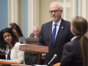 Quebec Finance Minister Carlos Leitao tables his economic update Oct. 25, 2016, in Quebec City.