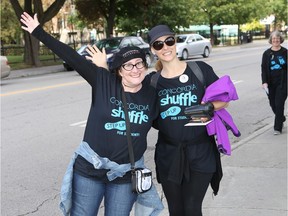 Concordia University staff members Janine Lavallée, left, and Louise Morgan at the finish line of Concordia's 27th Shuffle, a 6.5-kilometre walkathon between the university's Sir George Williams and Loyola campuses.