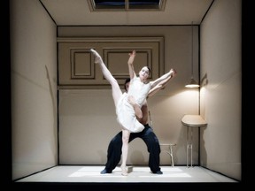 In Sehnsucht, a duet unfolds inside a suspended room on stage while a group of dancers remains outside as observers.