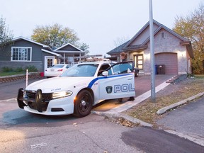 Châteaguay police secure a home on Doyon St. during raids throughout the Montérégie Oct. 27, 2016.