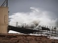 Waves crash ashore as Hurricane Matthew approaches the area on October 6, 2016 in Singer Island, Florida.  The hurricane is expected to make landfall sometime this evening or early in the morning as a possible Category 4 storm.