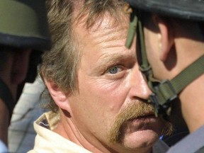 French anti-globalization campaigner José Bové during a demonstration in June 2001 in the West Bank town of Al-Khader, south of Bethlehem.