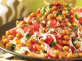 Golden chickpeas add crunch to this brightly coloured salad of bell peppers and tomatoes from The Chile Pepper Bible, by Toronto writer Judith Finlayson.