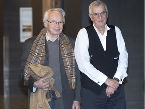 Former Liberal organizer Jacques Corriveau, left, and his lawyer, Gérald Soulière, arrive at the courthouse in October 2016 for closing arguments in his trial on charges of influence peddling, money laundering and forgery.