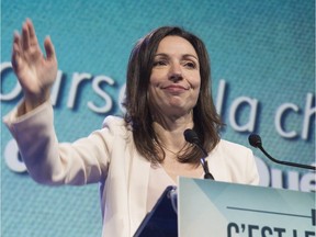 Parti Quebecois leadership candidate Martine Ouellet waves to supporters after speaking to them before hearing the leadership results, at the Parti Quebecois leadership race results evening, Friday, October 7, 2016 in Levis Que.