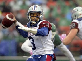 Montreal Alouettes quarterback Vernon Adams Jr. spots a receiver through the rain during first half CFL action against the Saskatchewan Roughriders, in Regina on Saturday, October 22, 2016.