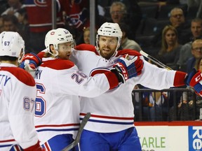 Shea Weber #6 of the Montreal Canadiens celebrates the game winning powerplay goal at 17:03 of the third period against the New York Islanders and is joined by Jeff Petry #26 at the Barclays Center on October 26, 2016 in the Brooklyn borough of New York City. The Canadiens defeated the Islanders 3-2.